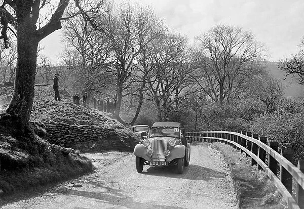 Kay Petres Singer Nine competing in the RAC Rally, 1939. Artist: Bill Brunell