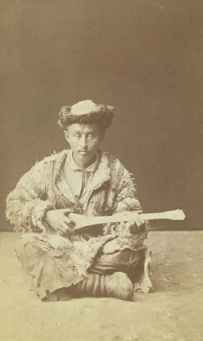 Framed Print : Kazakh man, a musician with a dombra, seated, between 1870 and 1886. Creator: Unknown Framed Print : Kazakh man, a musician with a dombra, seated, between 1870 and 1886. Creator: Unknown