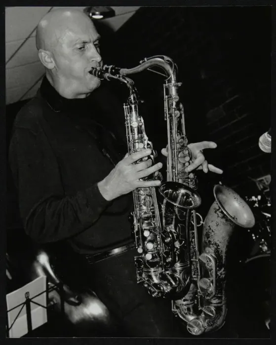 Framed Print : Kelvin Christiane playing two saxophones at The Fairway, Welwyn Garden City, Hertfordshire, 2002 Framed Print : Kelvin Christiane playing two saxophones at The Fairway, Welwyn Garden City, Hertfordshire, 2002