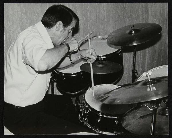 Kenny Clare playing the drums, London, 1978. Artist: Denis Williams