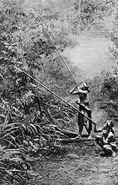 Kenyah men hunting for monkeys with blowpipes, Borneo, 1922. Artist: Dr Charles Hose