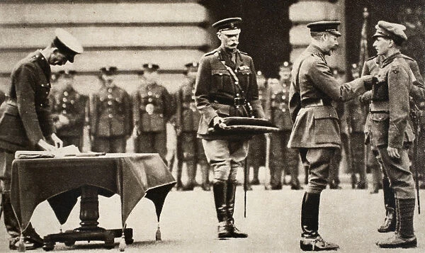 King George V awarding the Victoria Cross to Private Wilfred Edwards, 1917. Artist