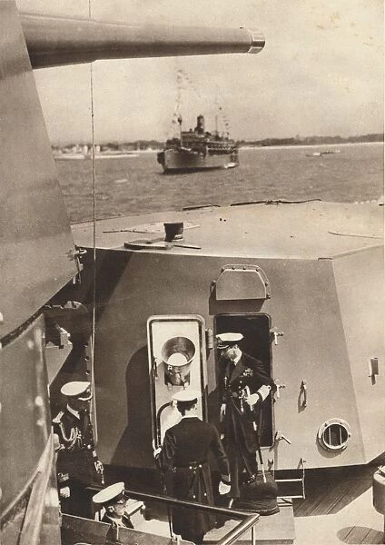 King George VI in the gun turret of H. M.s Southampton, 1937