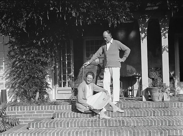 King, Hamilton, Mr. and Mrs. seated on the steps of their home, 1932 or 1933. Creator: Arnold Genthe