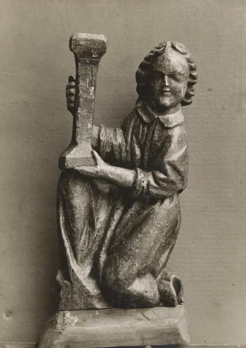 Framed Print : Kneeling figure with a candlestick, (1925-1930). Creator: Unknown Framed Print : Kneeling figure with a candlestick, (1925-1930). Creator: Unknown