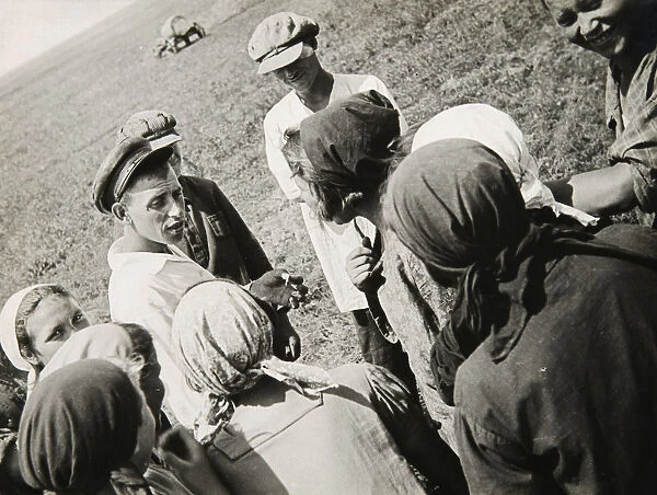 A Kolkhoz brigade taking a break, USSR, 1931