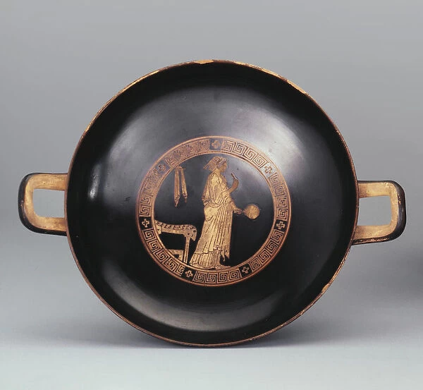 Kylix. A Woman with a Mirror. Attic pottery