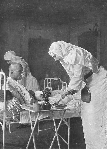 La Reine Marie de Roumanie au chevet des blesses, 1916. Creator: Unknown