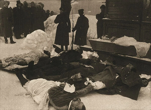 La Revolution Russe; Apres une journee sanglante: un factionnaire garde-les morts, 1917. Creator: Unknown