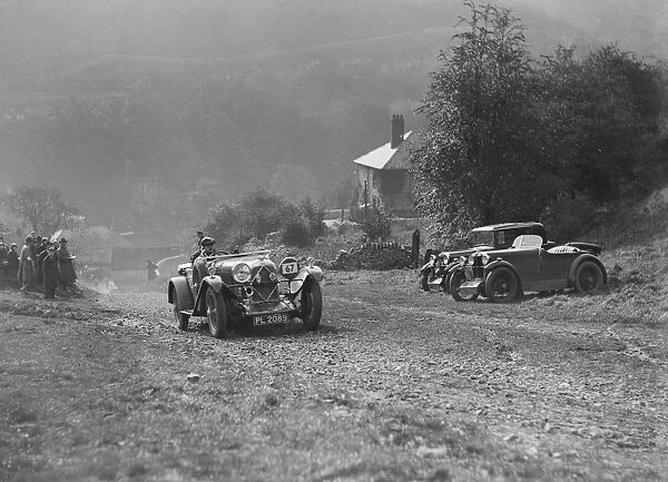 Lagonda of Lord de Clifford passing two MG M types during the MCC Sporting Trial, 1930