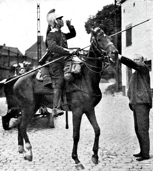 L'aide Francaise a la Belgique; Un paysan offre a boire a une estafette, 1914. Creator: Unknown