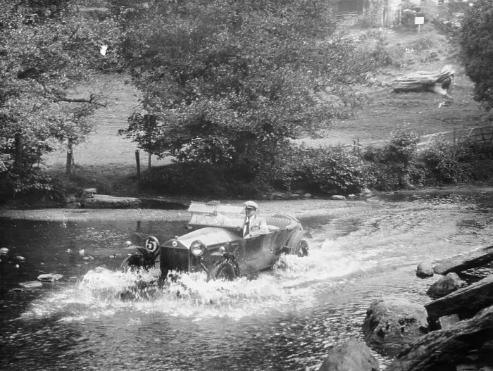 Framed Print : A Lancia Lambda being driven through water, c1925 Framed Print : A Lancia Lambda being driven through water, c1925