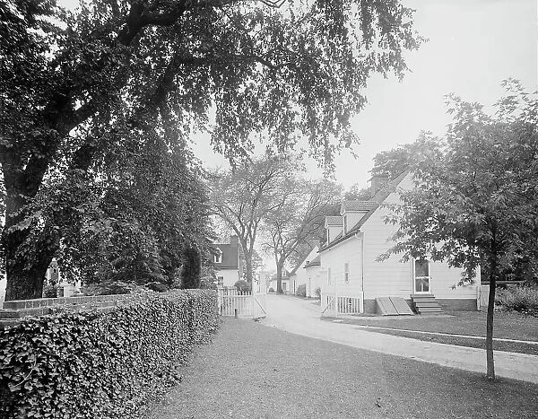 Lane in rear of spinning house at Mt. Vernon, c.between 1910 and 1920. Creator: Unknown