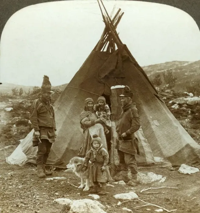 Framed Print : Laplander family and sledge dog - outside their summer home - on a hillside in Norway, c1905 Framed Print : Laplander family and sledge dog - outside their summer home - on a hillside in Norway, c1905