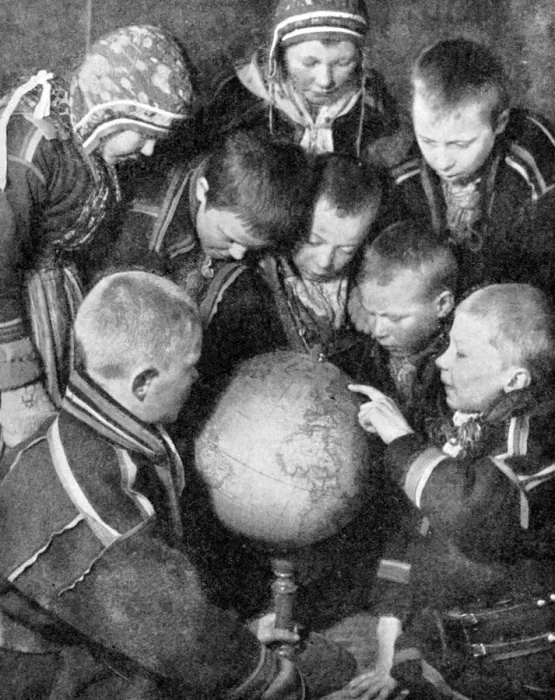 Framed Print : Lapp children looking at a globe, 1936 Framed Print : Lapp children looking at a globe, 1936