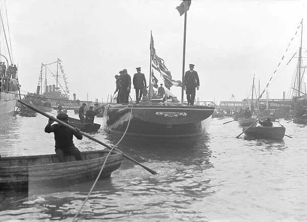 The launch of Shamrock IV at Gosport, May 1914. Creator: Kirk & Sons of Cowes