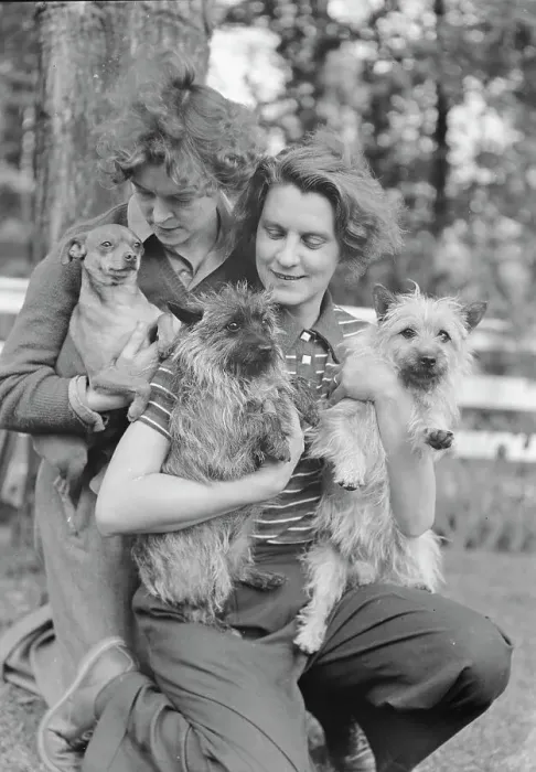 Framed Print : Le Gallienne, Eva, and unidentified woman, with dogs, outdoors, 1937 Creator: Arnold Genthe Framed Print : Le Gallienne, Eva, and unidentified woman, with dogs, outdoors, 1937 Creator: Arnold Genthe