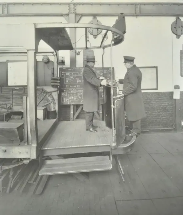 Framed Print : Learner-driver under instruction in a mock-up of tram car cab, London, 1932 Framed Print : Learner-driver under instruction in a mock-up of tram car cab, London, 1932