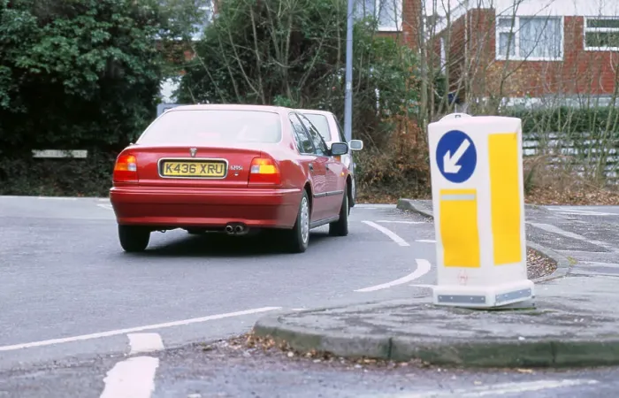 Framed Print : Keep left bollard.Road junction Framed Print : Keep left bollard.Road junction