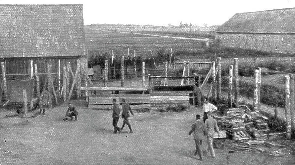 Les camps de represailles; Deux aspects de la cour de 30 metres de cote que les officiers... 1916. Creator: Unknown