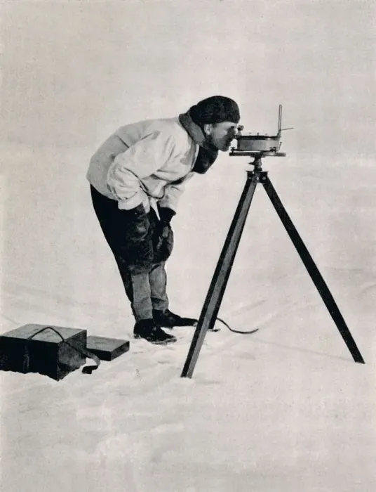 Framed Print : Lieut. Pennell with a Prismatic Compass, December 1910, (1913). Artist: Herbert Ponting Framed Print : Lieut. Pennell with a Prismatic Compass, December 1910, (1913). Artist: Herbert Ponting