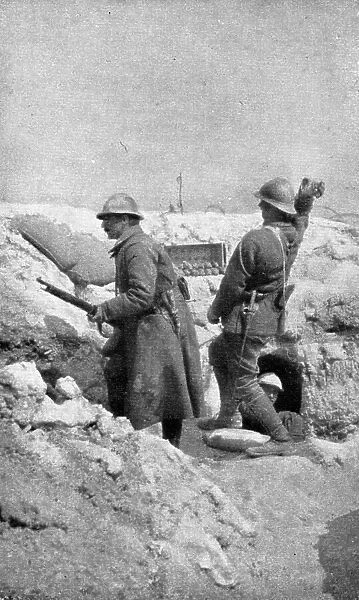 Life in the trenches in Champagne; The outpost re-arms immediately... 1917. Creator: Unknown