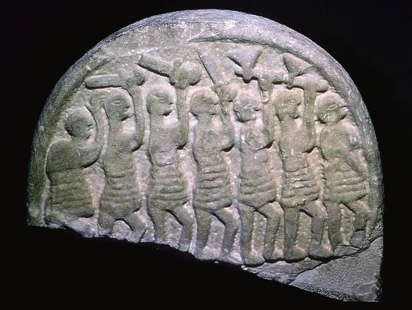 The Lindisfarne Stone showing warriors who may be vikings, Holy Island, Northumbria