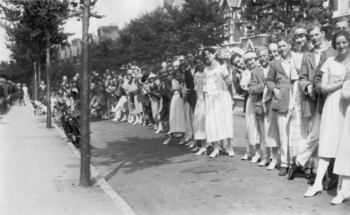 Framed Print : A line of people, c1920s Framed Print : A line of people, c1920s