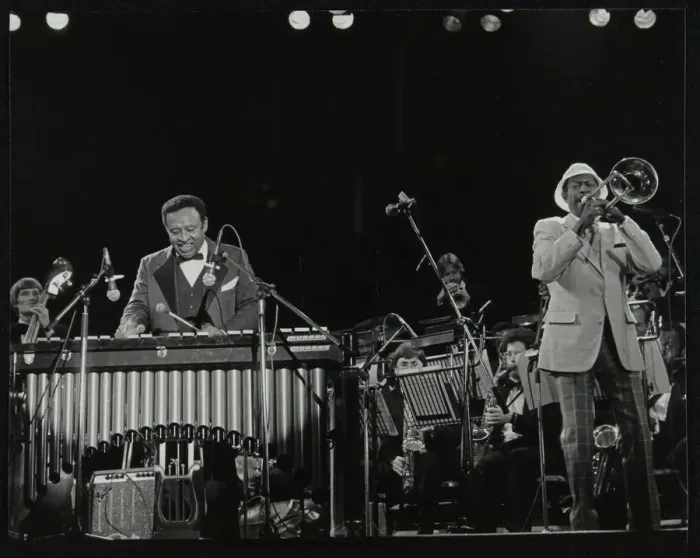Framed Print : The Lionel Hampton Orchestra on stage at Knebworth, Hertfordshire, July 1982. Artist Framed Print : The Lionel Hampton Orchestra on stage at Knebworth, Hertfordshire, July 1982. Artist