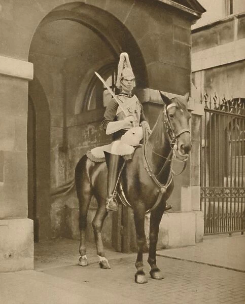 A Living Statue in Whitehall: The Lifeguards Sentry, c1935. Creator: Unknown