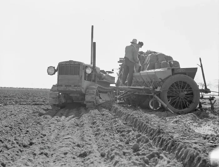 Framed Print : Loading bins of potato planter with fertilizer and seed... Kern County, California, 1939. Creator: Dorothea Lange Framed Print : Loading bins of potato planter with fertilizer and seed... Kern County, California, 1939. Creator: Dorothea Lange