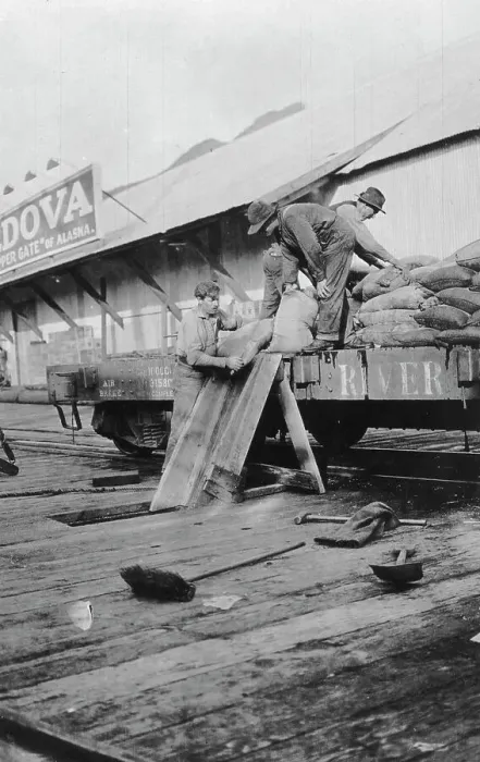 Framed Print : Loading copper, between c1900 and c1930. Creator: Unknown Framed Print : Loading copper, between c1900 and c1930. Creator: Unknown