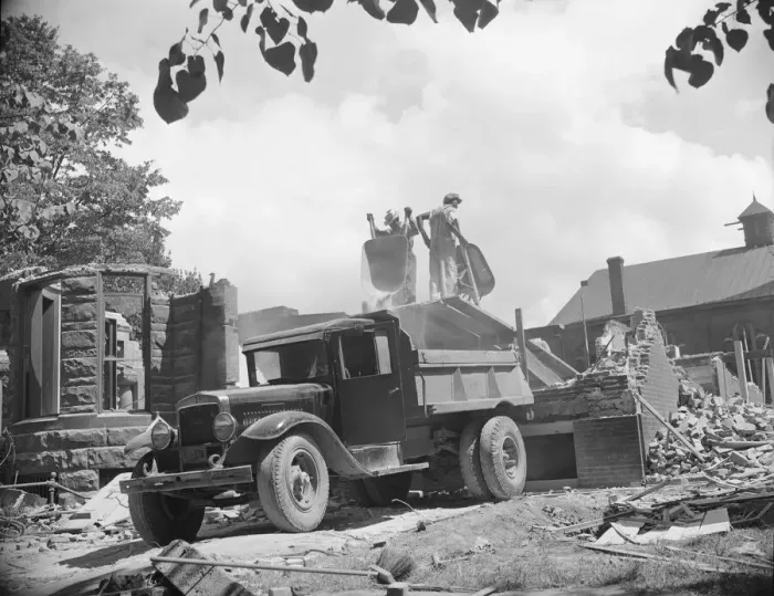 Framed Print : Loading debris from wrecked buildings along Independence Avenue, Washington, D. C, 1942. Creator: Gordon Parks Framed Print : Loading debris from wrecked buildings along Independence Avenue, Washington, D. C, 1942. Creator: Gordon Parks