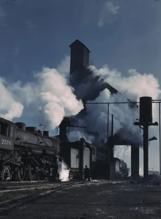 Framed Print : Locomotives over the ash pit at the roundhouse and coaling station... Chicago, Ill. 1942. Creator: Jack Delano Framed Print : Locomotives over the ash pit at the roundhouse and coaling station... Chicago, Ill. 1942. Creator: Jack Delano