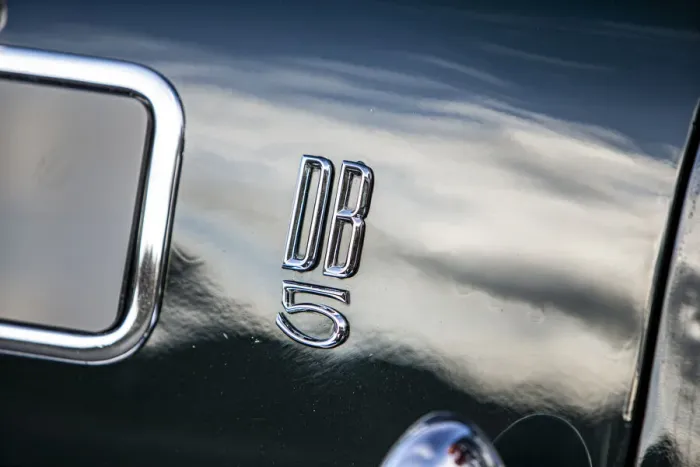 Framed Print : Logo on a 1965 Aston Martin DB5. Creator: Unknown Framed Print : Logo on a 1965 Aston Martin DB5. Creator: Unknown