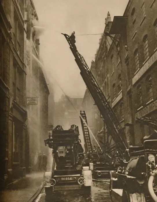Framed Print : How The London Fire Brigade Comes To Grips With Its Enemy, c1935. Creator: Unknown Framed Print : How The London Fire Brigade Comes To Grips With Its Enemy, c1935. Creator: Unknown