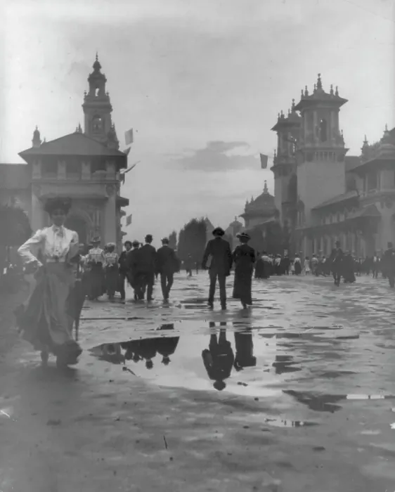 Framed Print : Looking down Midway after a rain, Pan American Exposition, Buffalo, NY, 1901. Creator: Frances Benjamin Johnston Framed Print : Looking down Midway after a rain, Pan American Exposition, Buffalo, NY, 1901. Creator: Frances Benjamin Johnston