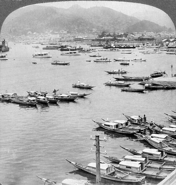 Looking north over vessels in the port of Nagasaki, Japan, 1904. Artist: Underwood & Underwood