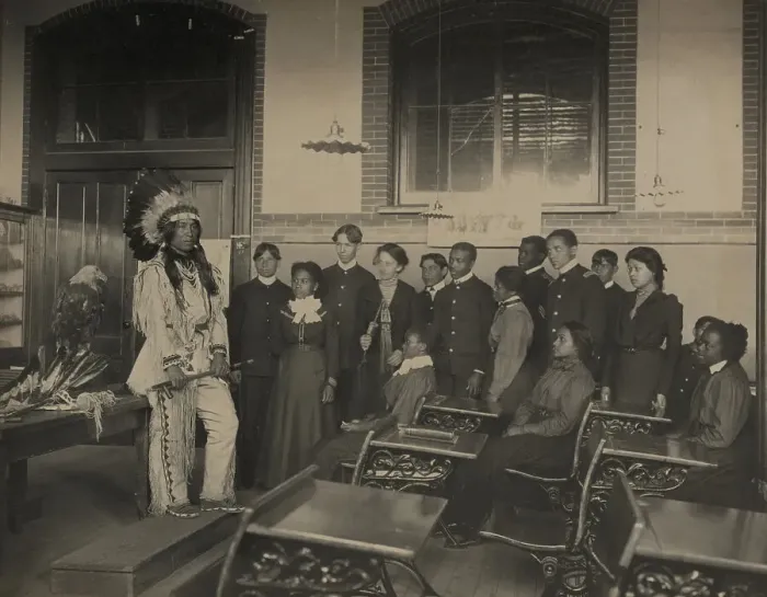 Framed Print : Louis Firetail (Sioux, Crow Creek), wearing tribal clothing, in American history... 1899 or 1900. Creator: Frances Benjamin Johnston Framed Print : Louis Firetail (Sioux, Crow Creek), wearing tribal clothing, in American history... 1899 or 1900. Creator: Frances Benjamin Johnston