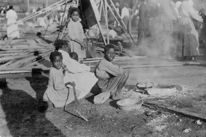 Framed Print : Louisiana Flood - refugees cook government rations, 1912. Creator: Bain News Service Framed Print : Louisiana Flood - refugees cook government rations, 1912. Creator: Bain News Service