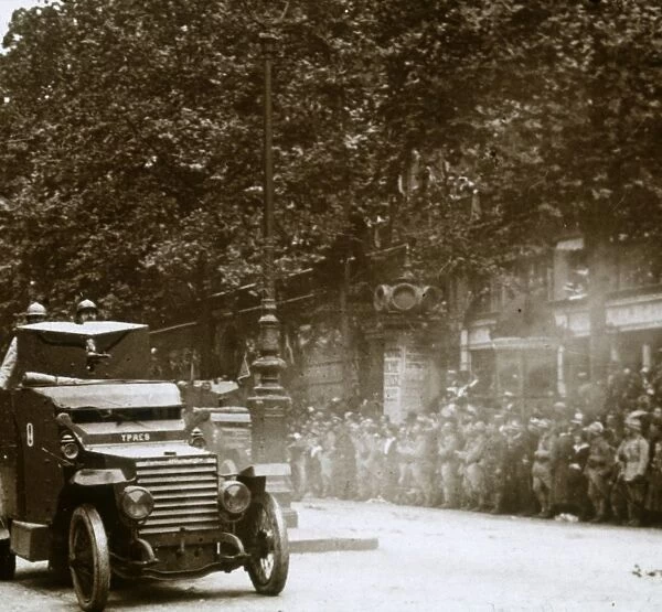 Machine gun mounted in armoured vehicle, victory parade, c1918