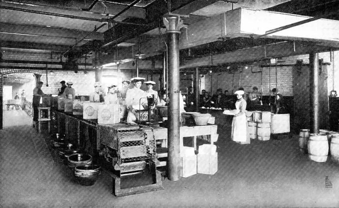 Framed Print : Where machinery is paramount: filling and weighing packages of lard, 1909. Creator: Unknown Framed Print : Where machinery is paramount: filling and weighing packages of lard, 1909. Creator: Unknown
