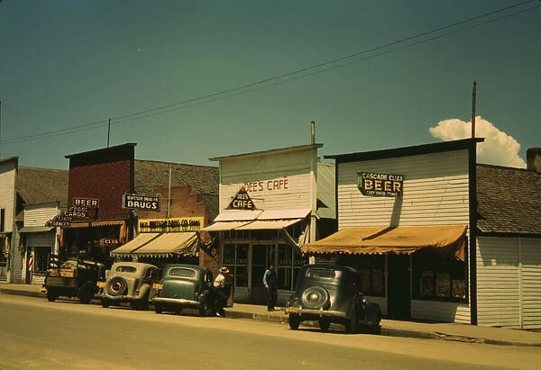 On main street of Cascade, Idaho... 1941. Creator: Russell Lee