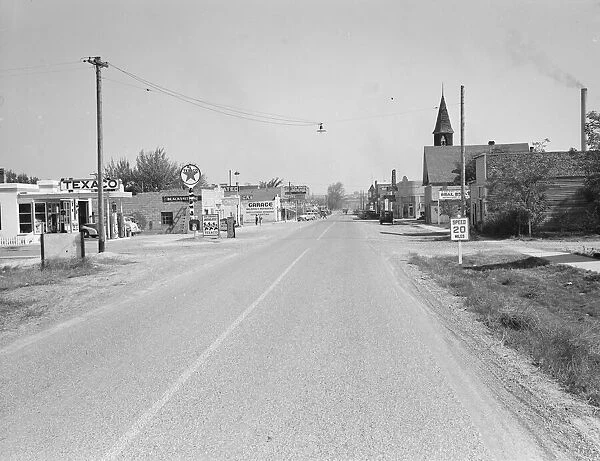 Main street of Nyssa, Oregon, on Saturday afternoon, 1939. Creator: Dorothea Lange