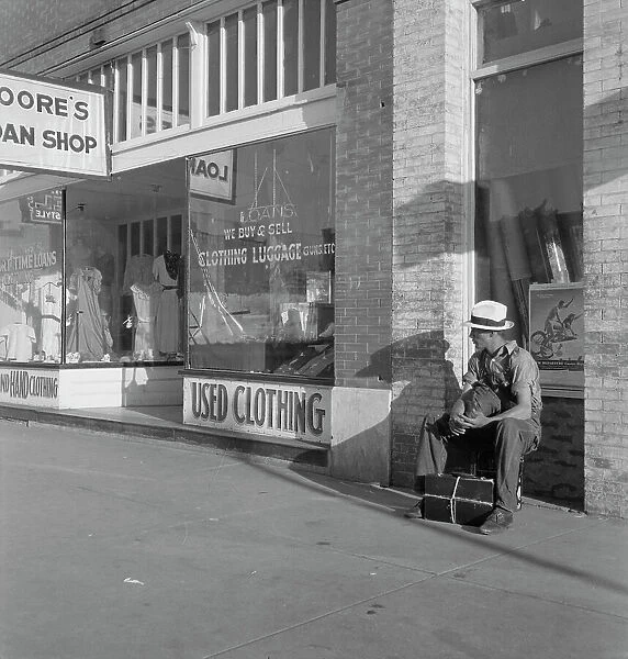Main street storefront, Chickasaw, Oklahoma, 1937. Creator: Dorothea Lange