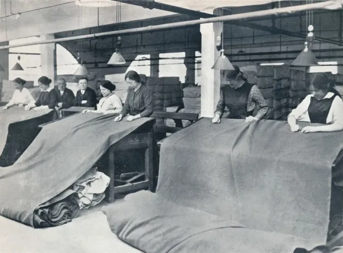 Framed Print : The Making of khaki: examining the finished cloth, c1914 Framed Print : The Making of khaki: examining the finished cloth, c1914