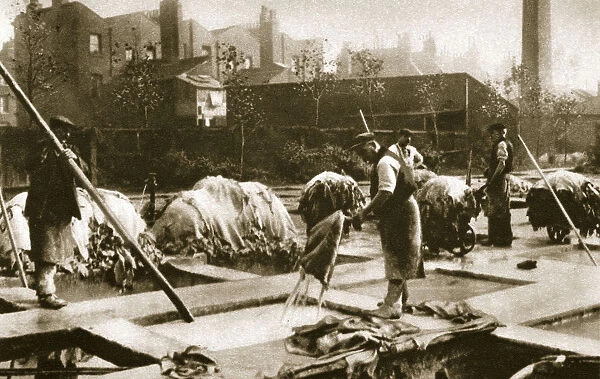 Making leather in the lime yard at Neckinger Mills, London, 20th century