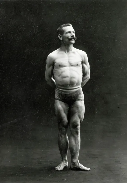 Framed Print : A male bodybuilder wearing bathing trunks, posing in a studio setting, between 1899 and 1908. Creator: Unknown Framed Print : A male bodybuilder wearing bathing trunks, posing in a studio setting, between 1899 and 1908. Creator: Unknown