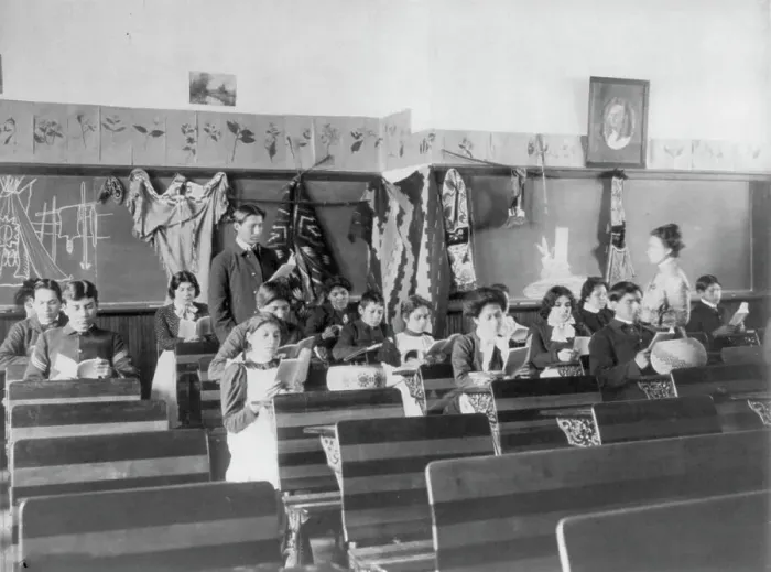 Framed Print : Male and female students reading in class, Carlisle Indian School, Carlisle, Pennsylvania, 1901. Creator: Frances Benjamin Johnston Framed Print : Male and female students reading in class, Carlisle Indian School, Carlisle, Pennsylvania, 1901. Creator: Frances Benjamin Johnston