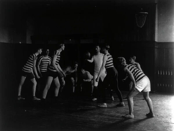 Male students playing basketball, Western High School, Washington, D.C. (1899?). Creator: Frances Benjamin Johnston